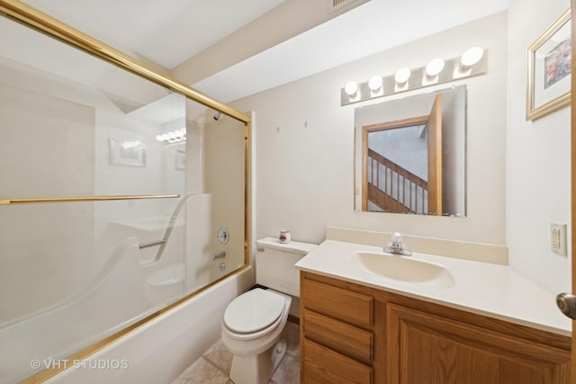 full bathroom featuring toilet, tile patterned floors, vanity, and shower / bath combination with glass door