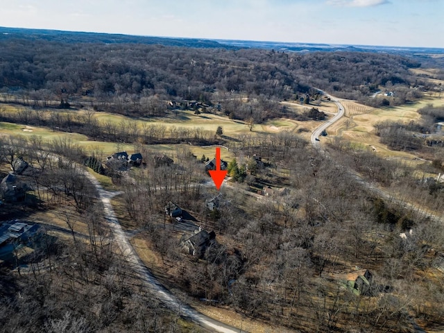 birds eye view of property with a rural view