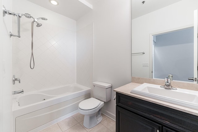 full bathroom with toilet, tile patterned flooring, tiled shower / bath, and vanity