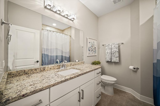 bathroom featuring toilet, a shower with shower curtain, vanity, and tile patterned floors