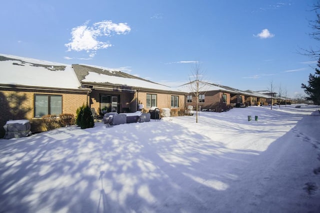 view of snow covered property