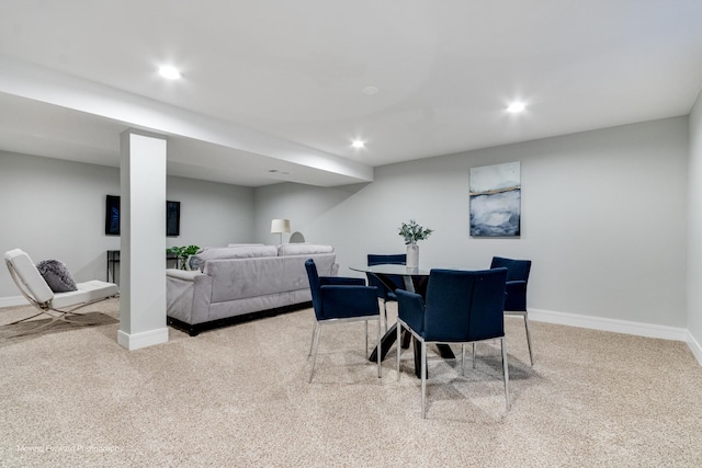 view of carpeted dining area