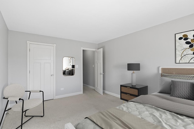 bedroom with light colored carpet