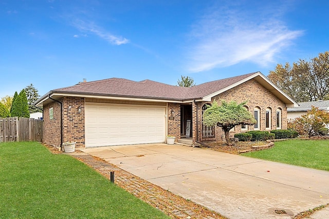 single story home with a front yard and a garage