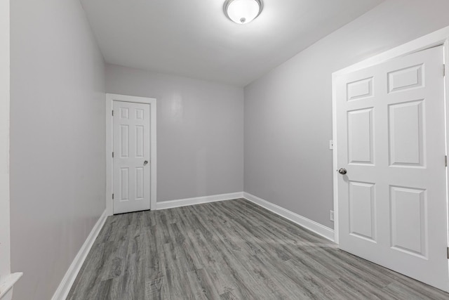 spare room with light hardwood / wood-style floors