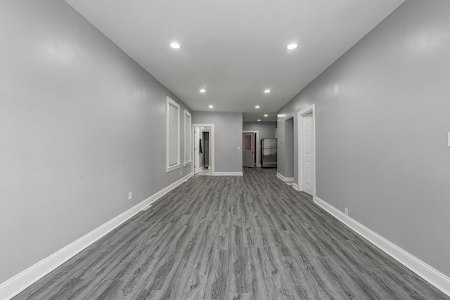 unfurnished living room featuring hardwood / wood-style floors