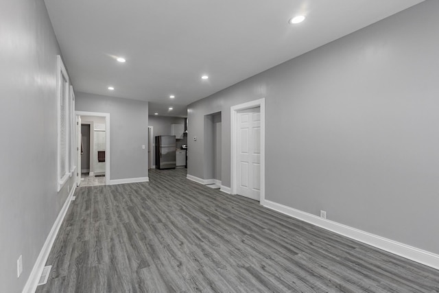 unfurnished living room featuring light hardwood / wood-style flooring