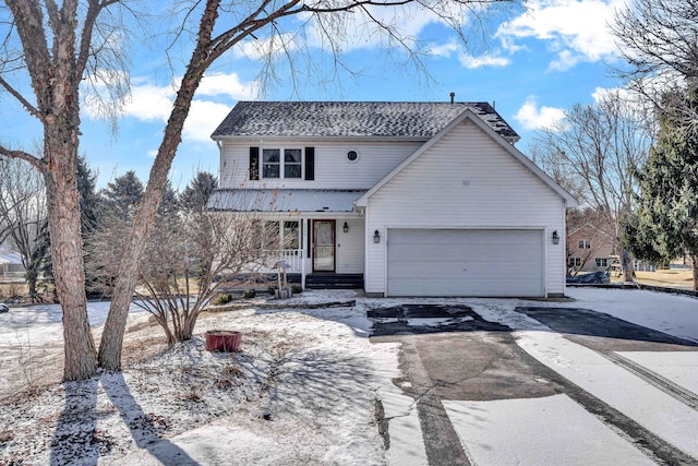 view of front of home with a garage