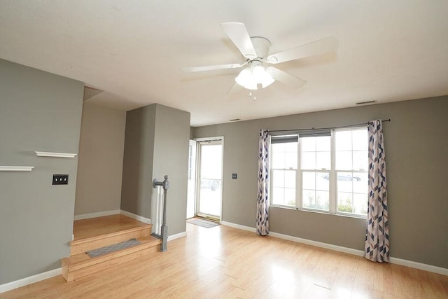 entrance foyer featuring light wood-type flooring and ceiling fan