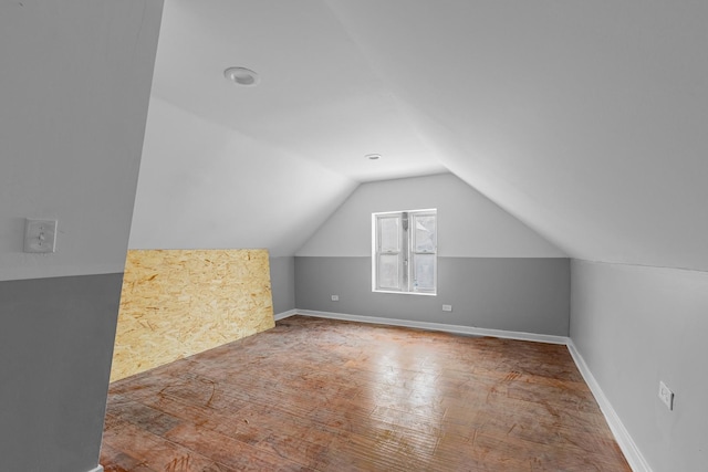 bonus room featuring vaulted ceiling