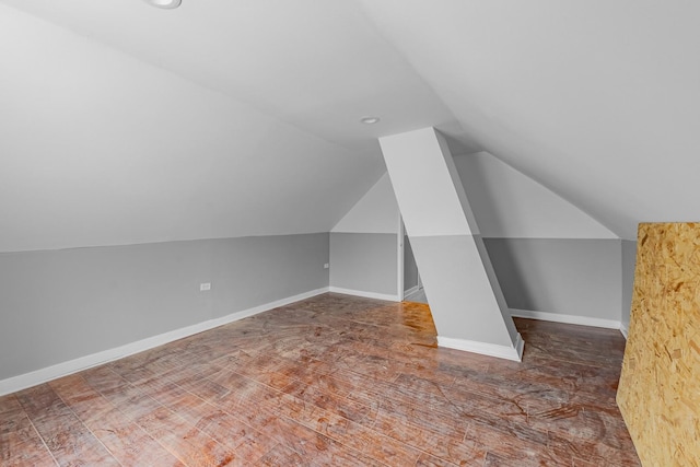 bonus room with vaulted ceiling