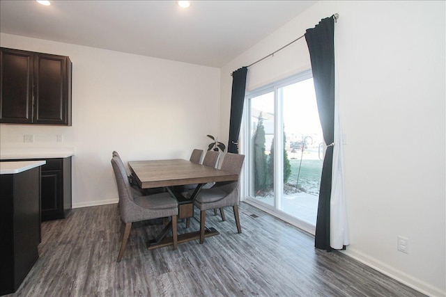 dining room featuring dark wood-type flooring