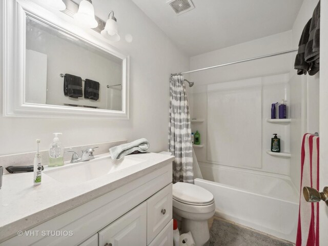 bathroom featuring crown molding and vanity