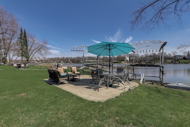 exterior space featuring a water view and a yard