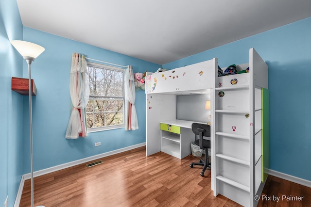 bedroom featuring light hardwood / wood-style floors