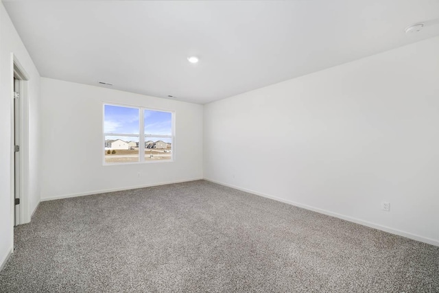 unfurnished room with carpet