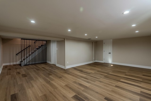 basement featuring wood-type flooring