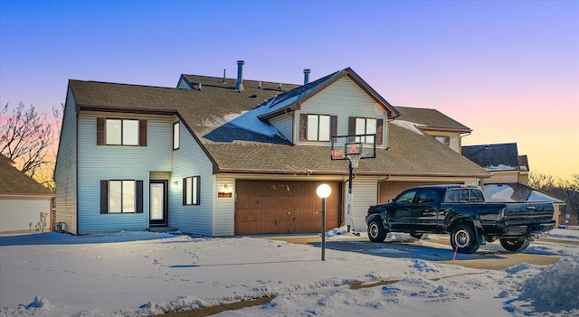 view of front of home with a garage