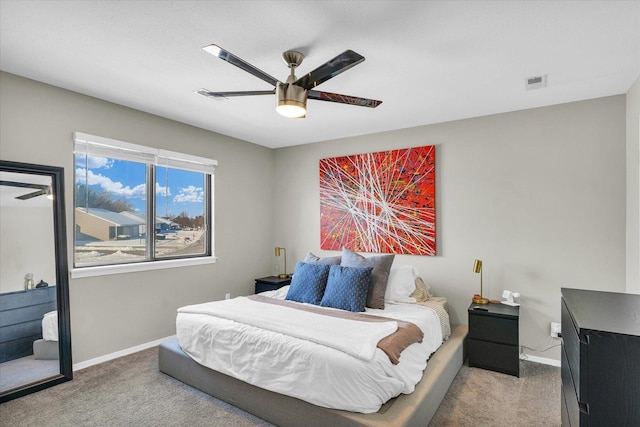 bedroom featuring ceiling fan and light colored carpet