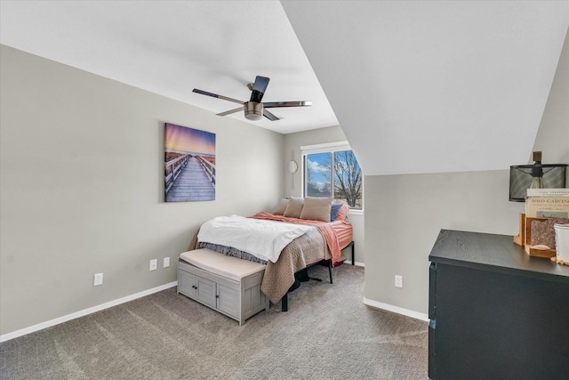 carpeted bedroom featuring ceiling fan and lofted ceiling