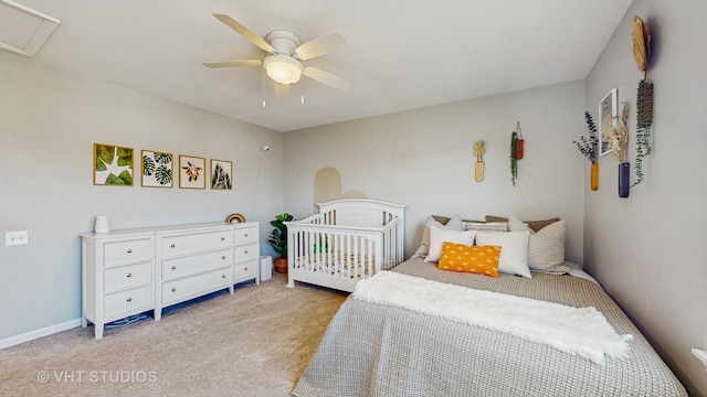 carpeted bedroom with ceiling fan