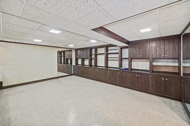 empty room with a paneled ceiling