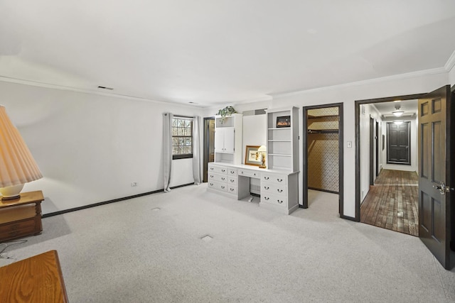 carpeted bedroom with crown molding