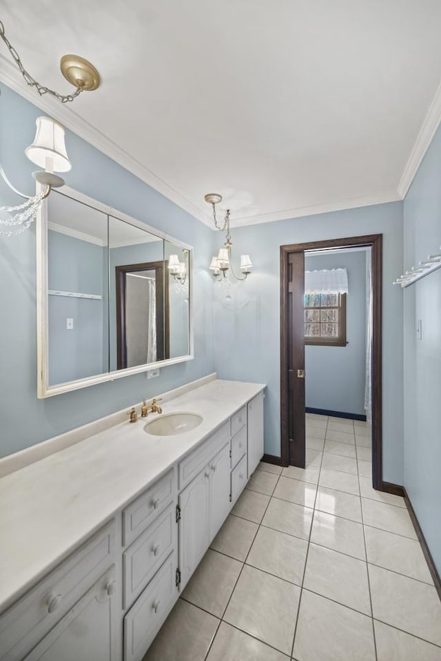 bathroom featuring tile patterned flooring, vanity, and ornamental molding