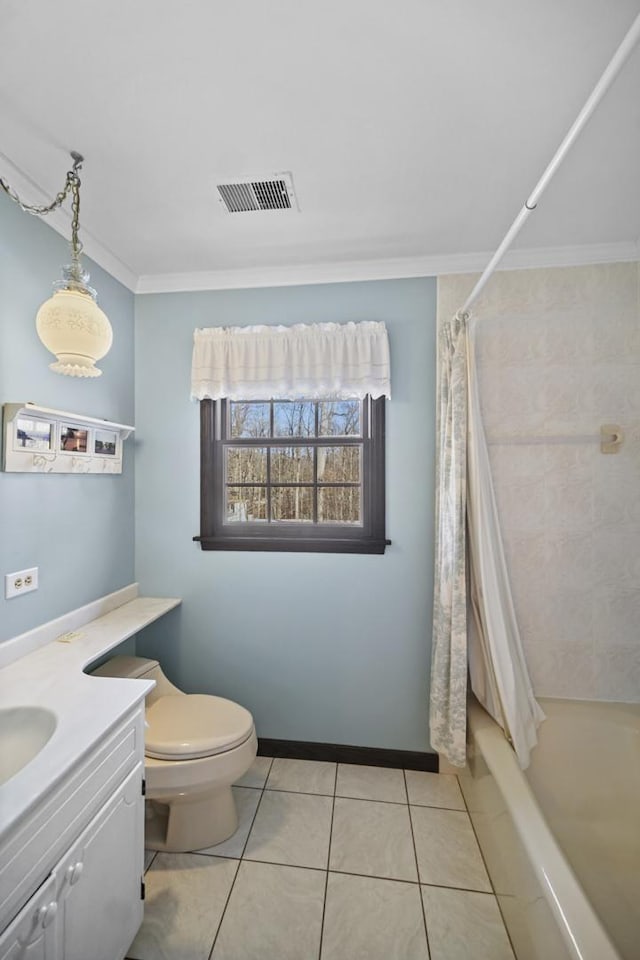 full bathroom with vanity, toilet, crown molding, tile patterned floors, and shower / bath combo with shower curtain