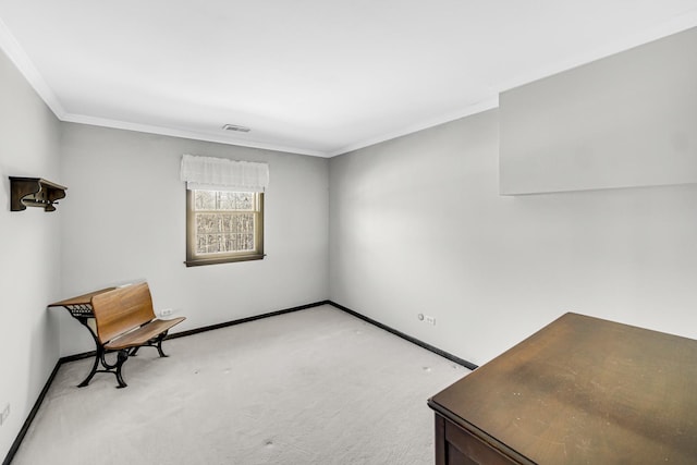 sitting room with light colored carpet and ornamental molding