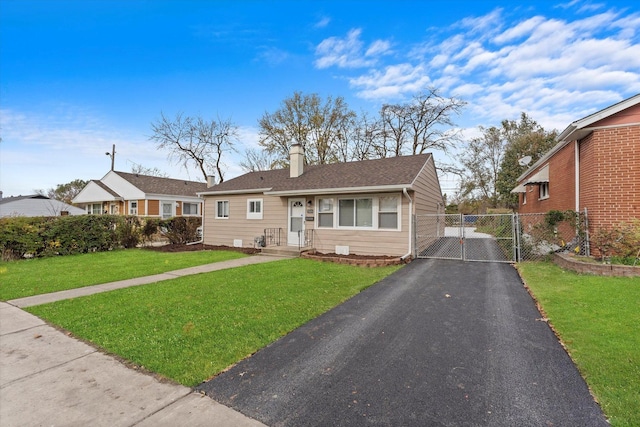 view of front of property with a front lawn