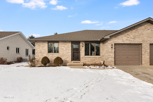 ranch-style home with a garage