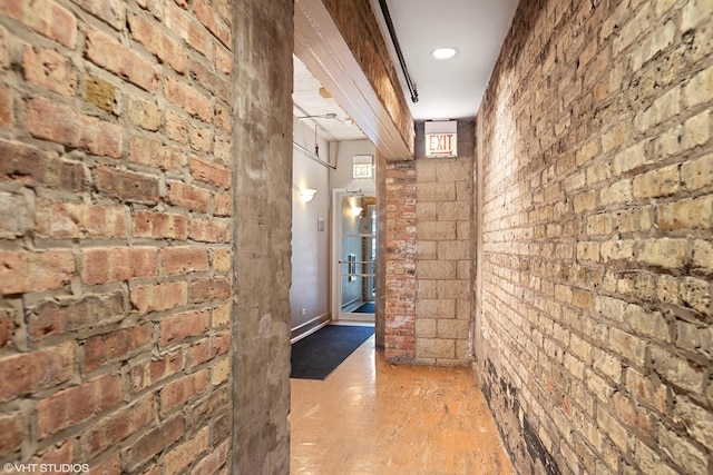 hall with brick wall