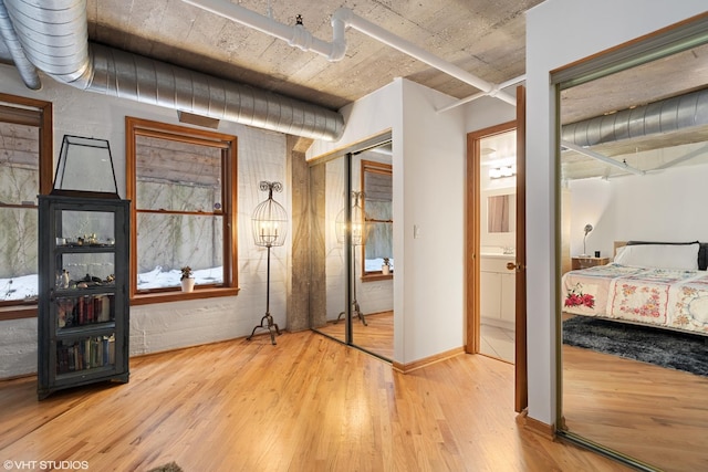 bedroom featuring wood finished floors