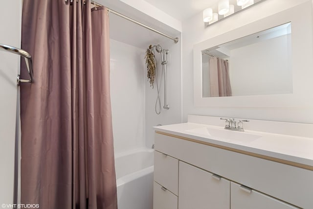 full bath featuring shower / tub combo and vanity