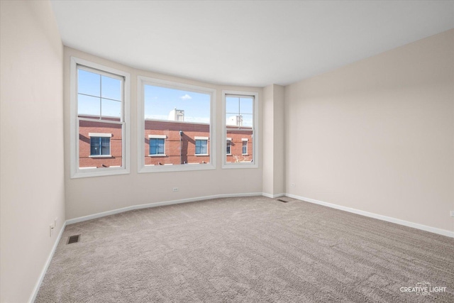 view of carpeted empty room