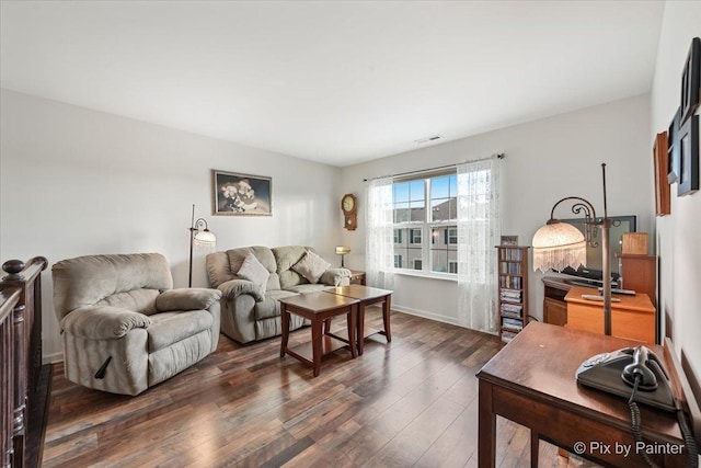 living room featuring dark hardwood / wood-style floors