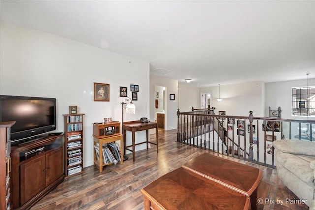 living room featuring dark wood-type flooring