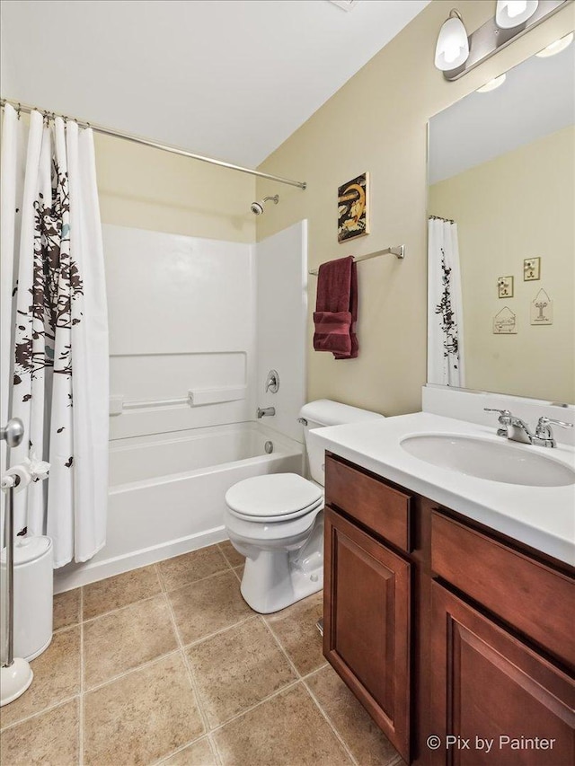 full bathroom featuring toilet, shower / bath combination with curtain, and vanity