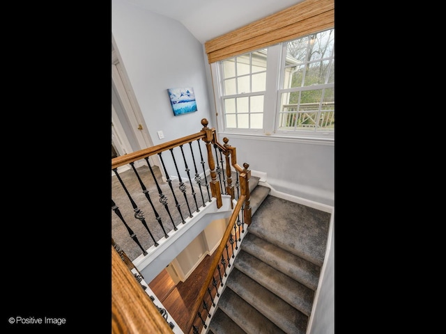 stairs with lofted ceiling