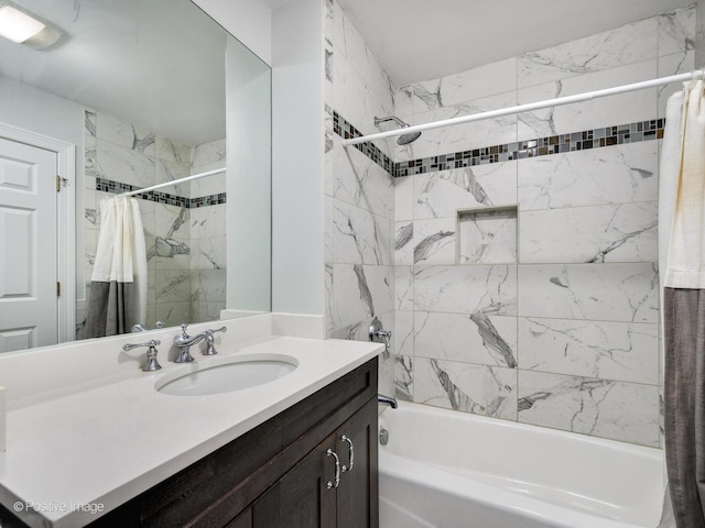 bathroom featuring vanity and shower / bath combo