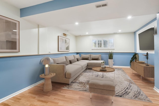 living room with light hardwood / wood-style floors