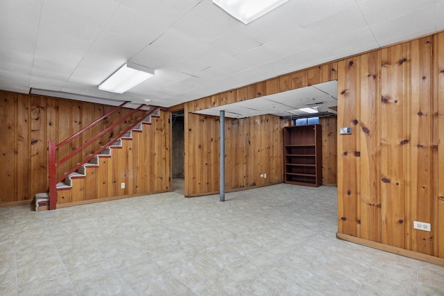 basement with wood walls