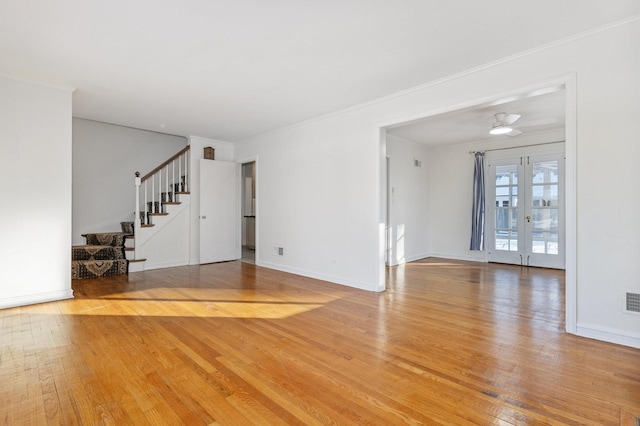 interior space with hardwood / wood-style floors and french doors