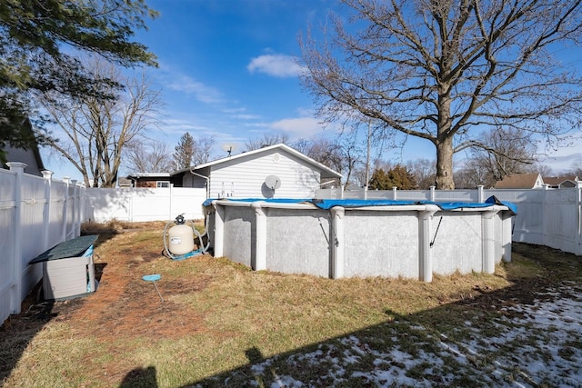 view of yard featuring a fenced in pool