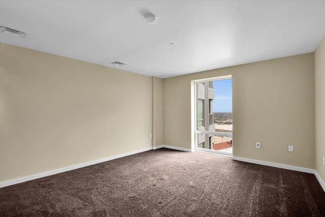 view of carpeted spare room