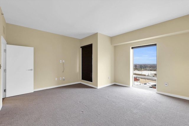 301 N Neil St Unit 808-809, Champaign, IL 61820 - unfurnished room with carpet and baseboards