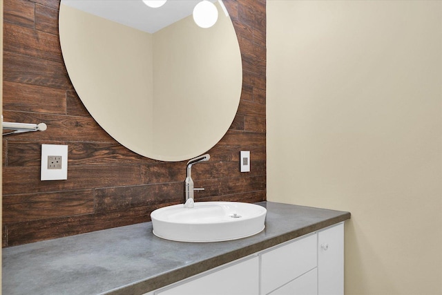 301 N Neil St Unit 808-809, Champaign, IL 61820 - bathroom with vanity and wood walls