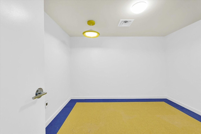 301 N Neil St Unit 808-809, Champaign, IL 61820 - unfurnished room featuring baseboards and dark carpet