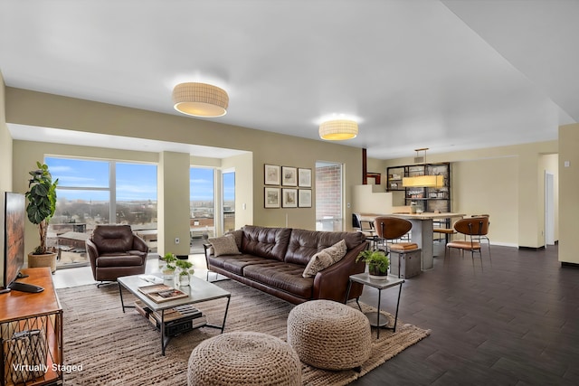 living room with dark hardwood / wood-style flooring